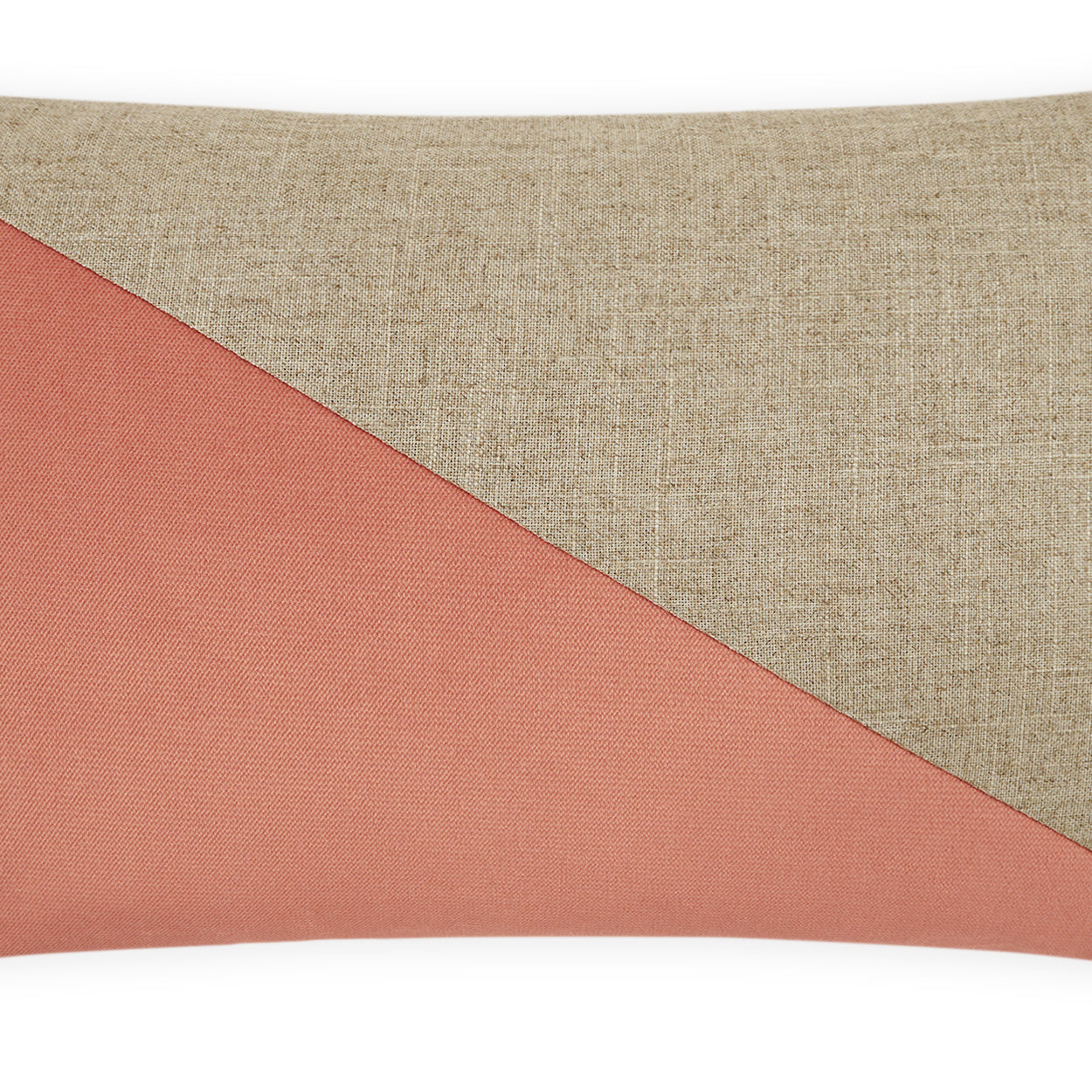 Rectangular lumbar pillow with diagonal blush color-block.