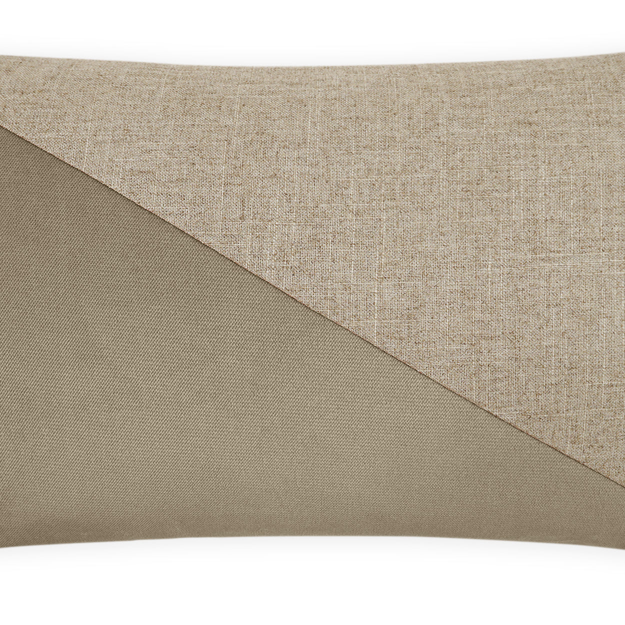 Two-tone rectangular lumbar pillow with driftwood color block: beige linen-textured top and taupe bottom, diagonal seam.