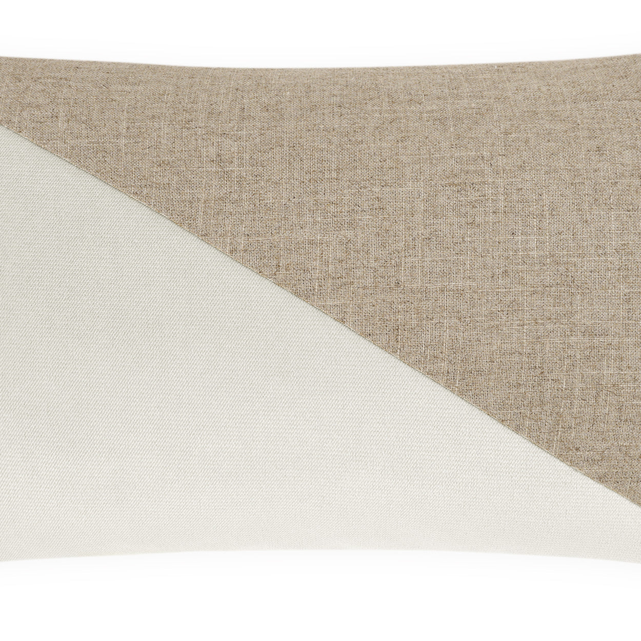 Two-tone rectangular lumbar pillow with a diagonal color-block split; marshmallow color block.