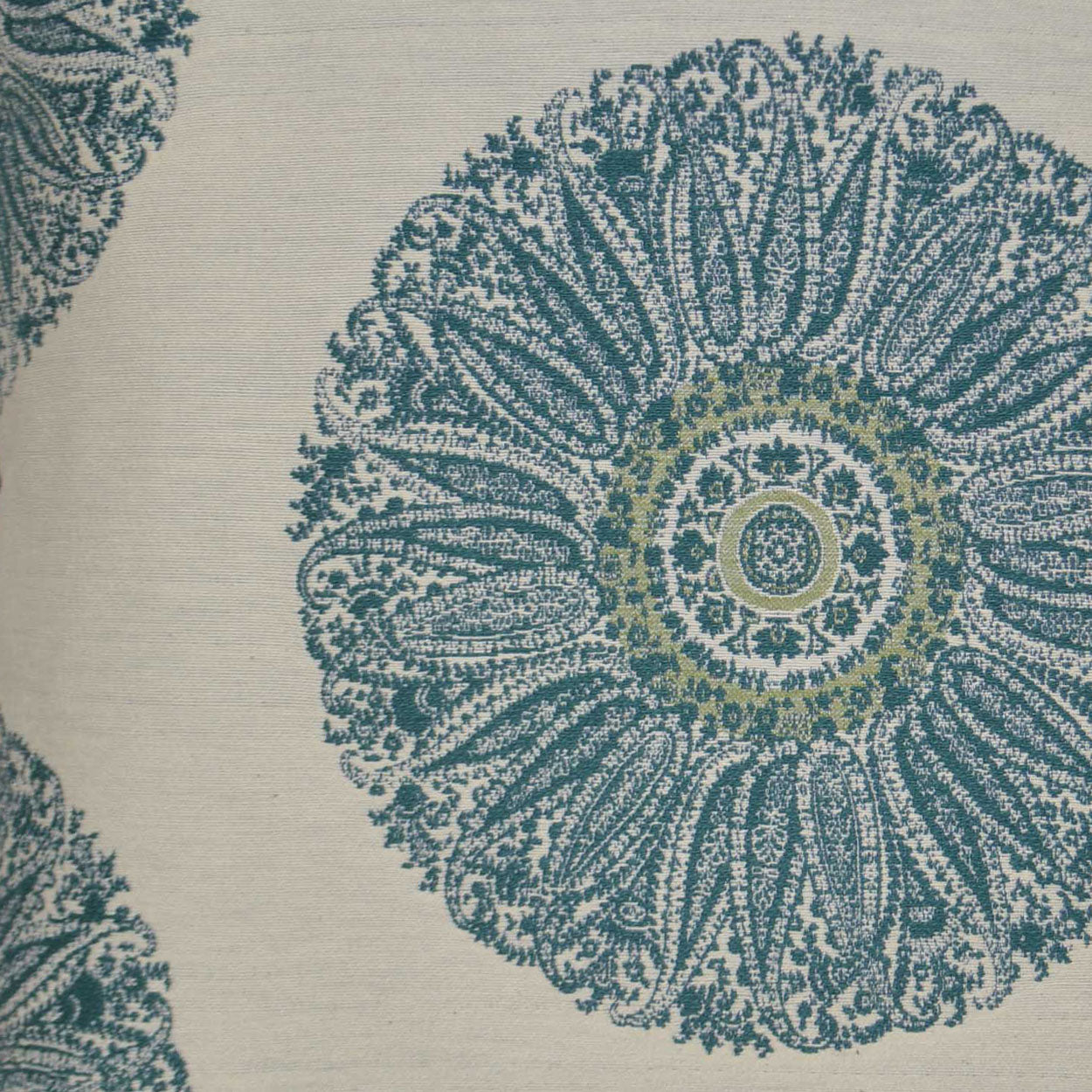 Teal circular mandala print on beige fabric; ornate radial textile pattern for decor or upholstery.