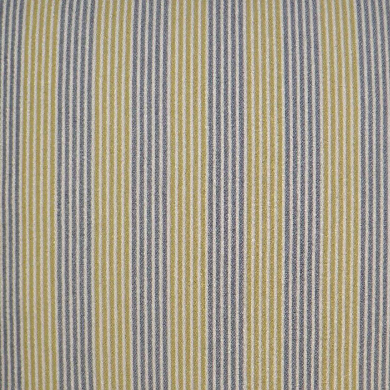 Yellow and blue-gray vertical striped cotton fabric with narrow woven stripes.