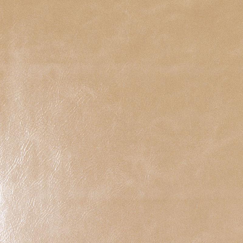 Close-up of light tan upholstery fabric with subtle grain and a soft sheen.