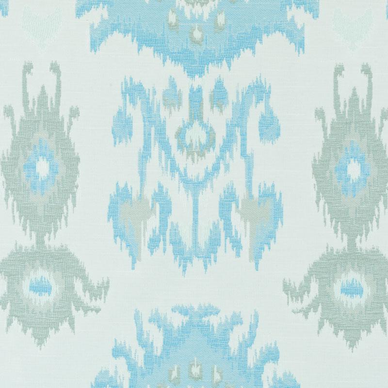 Ikat-inspired geometric pattern in pale blue, mint, and gray on ivory upholstery fabric.