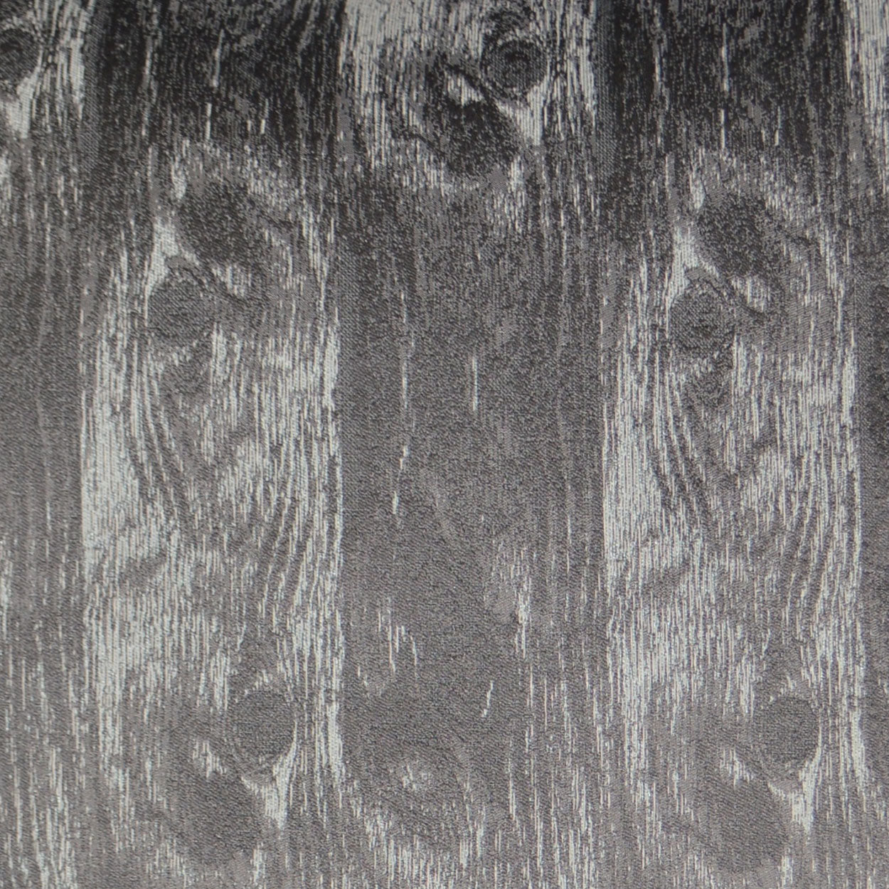 Gray fabric with a wood-grain print, textured upholstery for drapery or home decor.