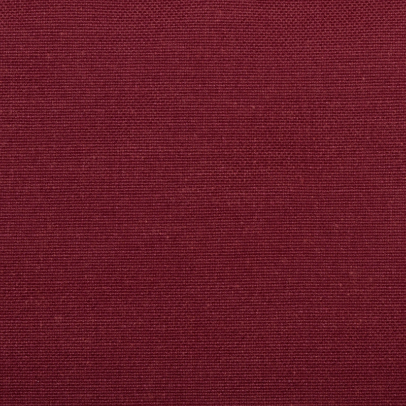 Close-up of burgundy woven fabric with a fine, tight texture; a rich textile suitable for upholstery or apparel.