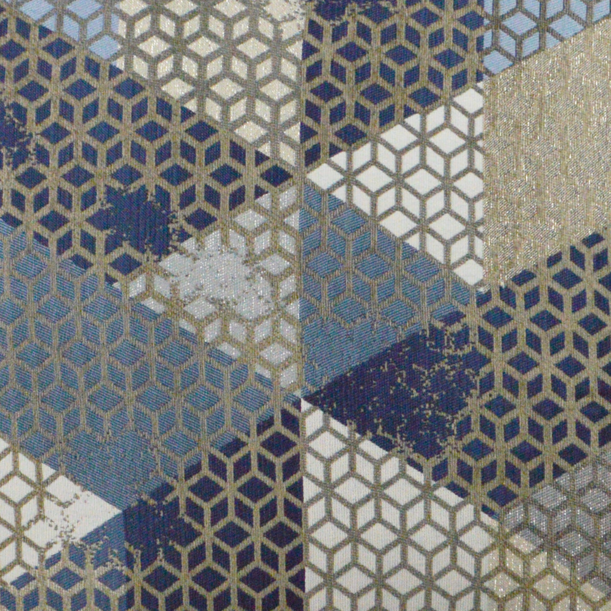 Geometric hex honeycomb fabric in navy, blue, beige and ivory with metallic gold outlines on diamond patches.
