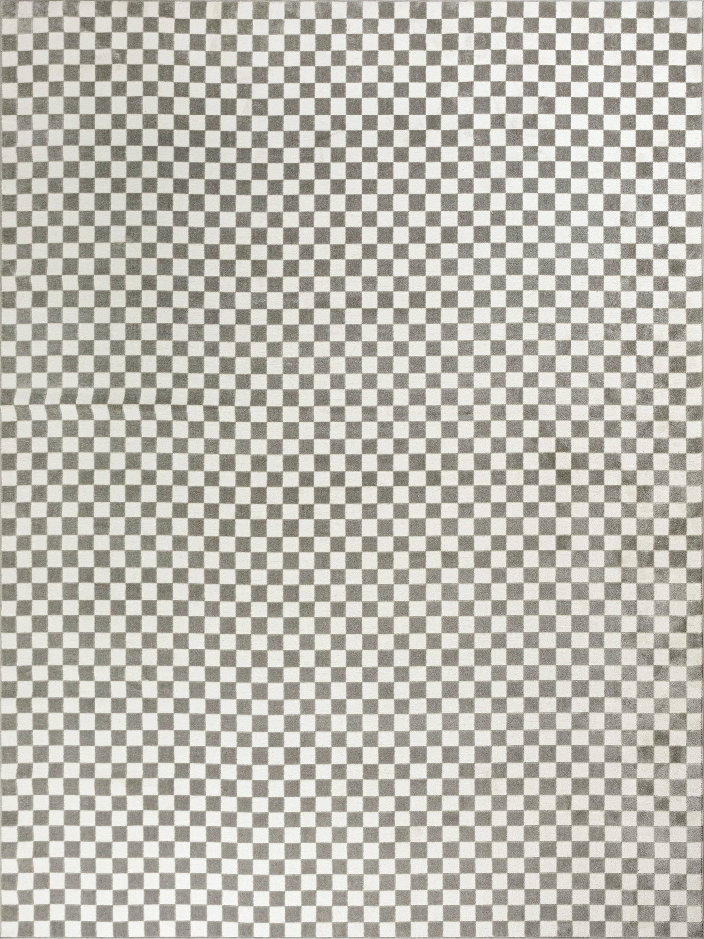 Monochrome black-and-white checkerboard rug with a small square grid pattern.