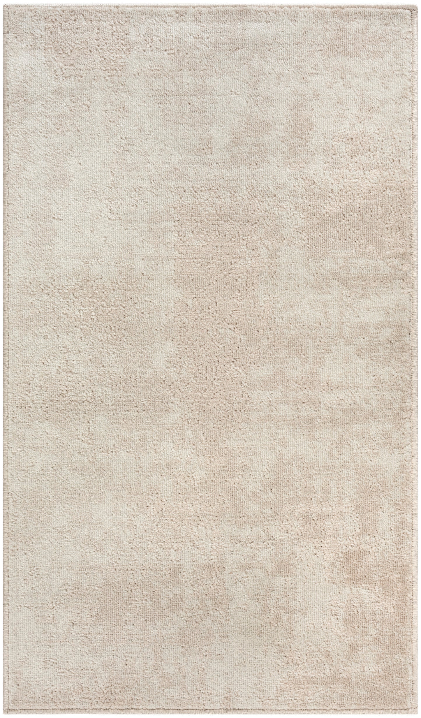 Rectangular beige plush area rug with subtle texture and soft, neutral tone.