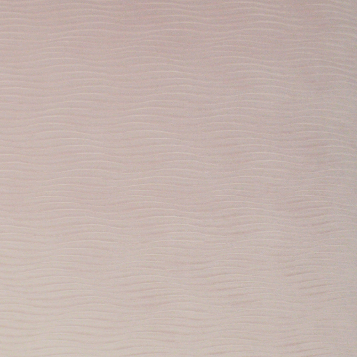 Beige fabric with soft pinkish tint and subtle wavy horizontal texture; lightweight woven material for upholstery or apparel.