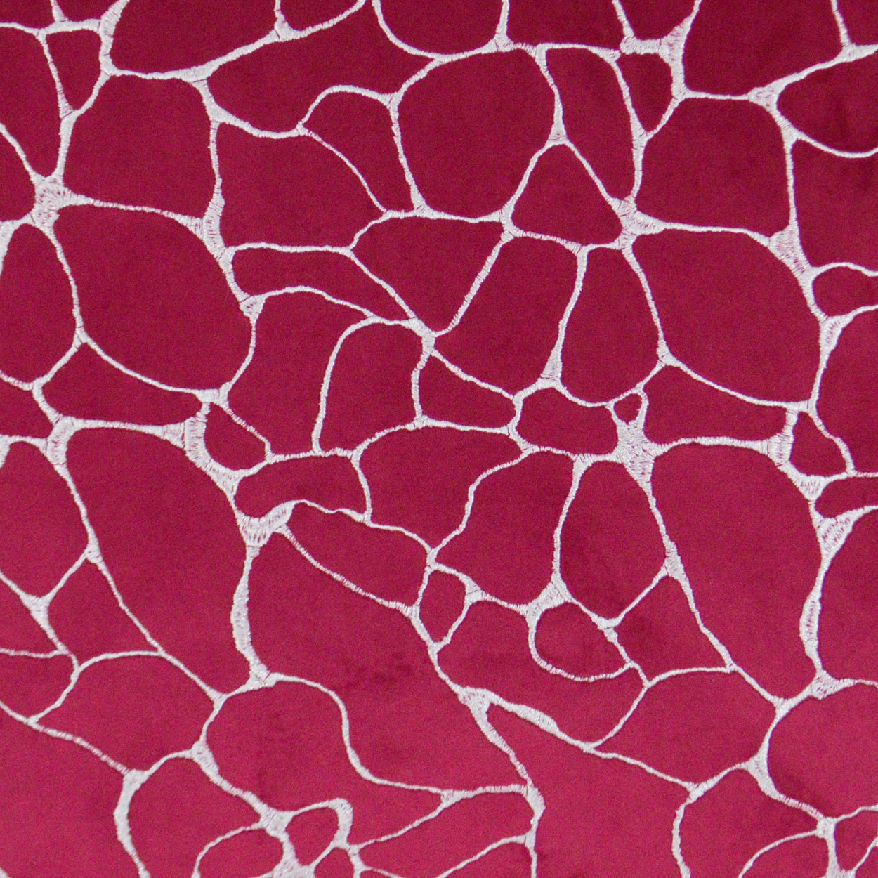 Magenta fabric with white crackle pattern, irregular mosaic lines.