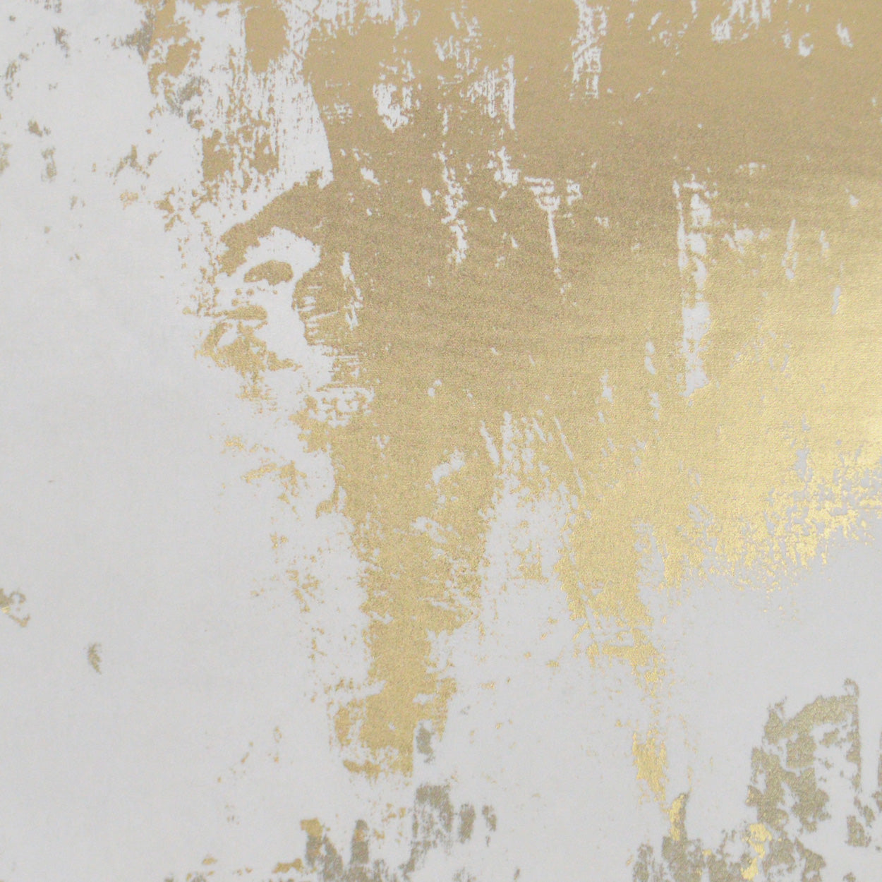Off-white fabric with irregular gold foil brushstroke pattern and shimmering metallic finish.