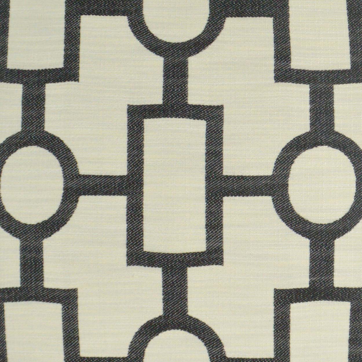 Beige fabric with dark navy geometric chain-link pattern of rectangles and circles; textile print