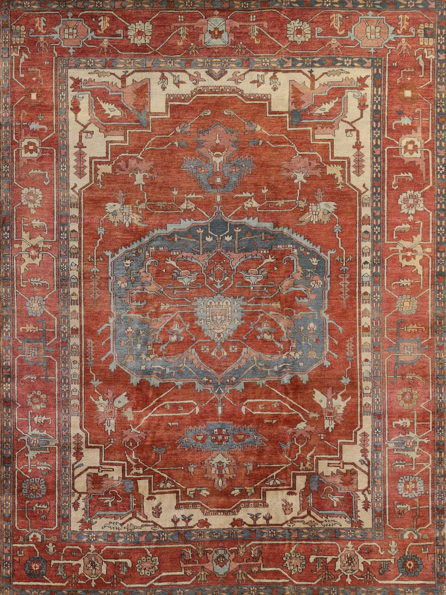 Ornate red and blue Persian-style area rug featuring intricate floral and geometric patterns with a warm, vintage appearance.