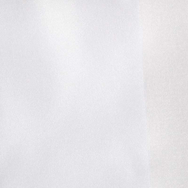 White textured fabric close-up with fine weave and subtle folds.