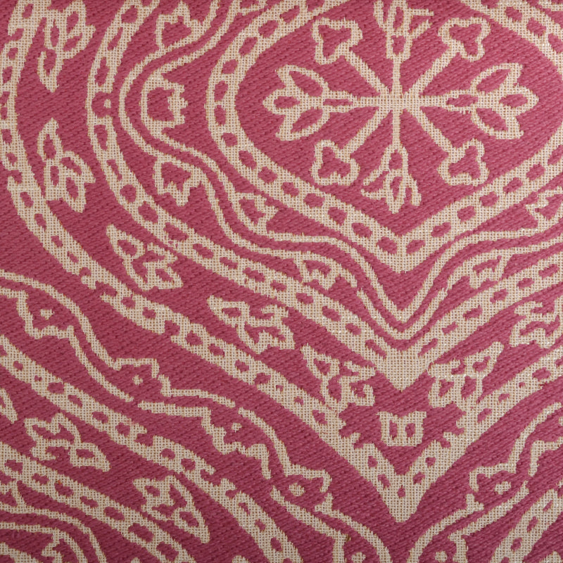 Pink woven upholstery fabric with a cream ornate floral/mandala motif; textured textile suitable for furniture upholstery.