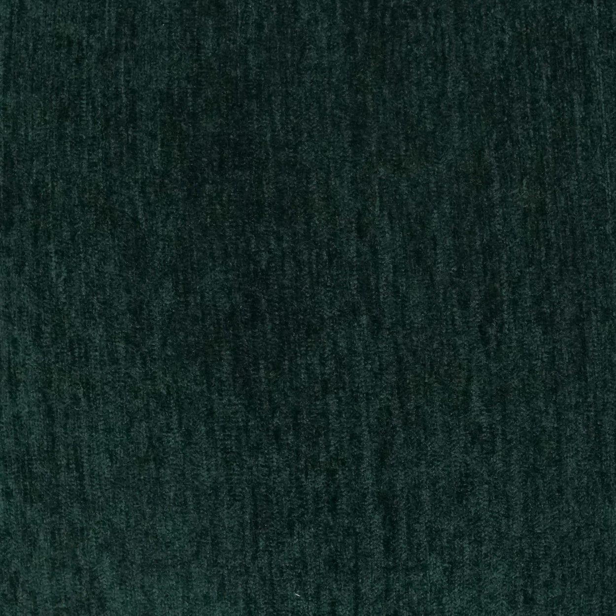 Dark emerald green velvet fabric close-up with plush nap and subtle sheen, for a 24" x 24" Hunter Solid Cuddle Pillow.