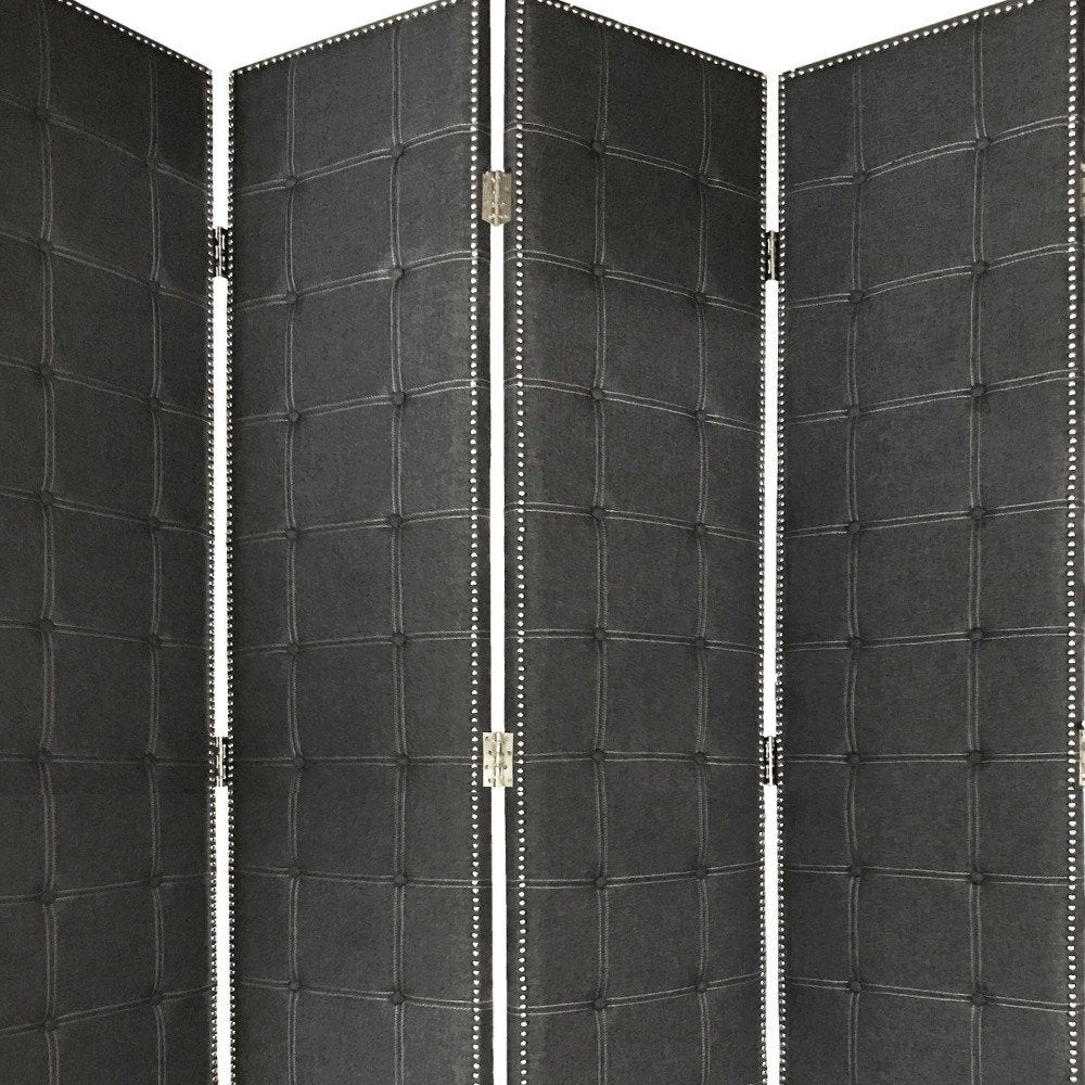 Three-panel black leather folding screen with grid-stitched squares and silver studded trim along the edges.