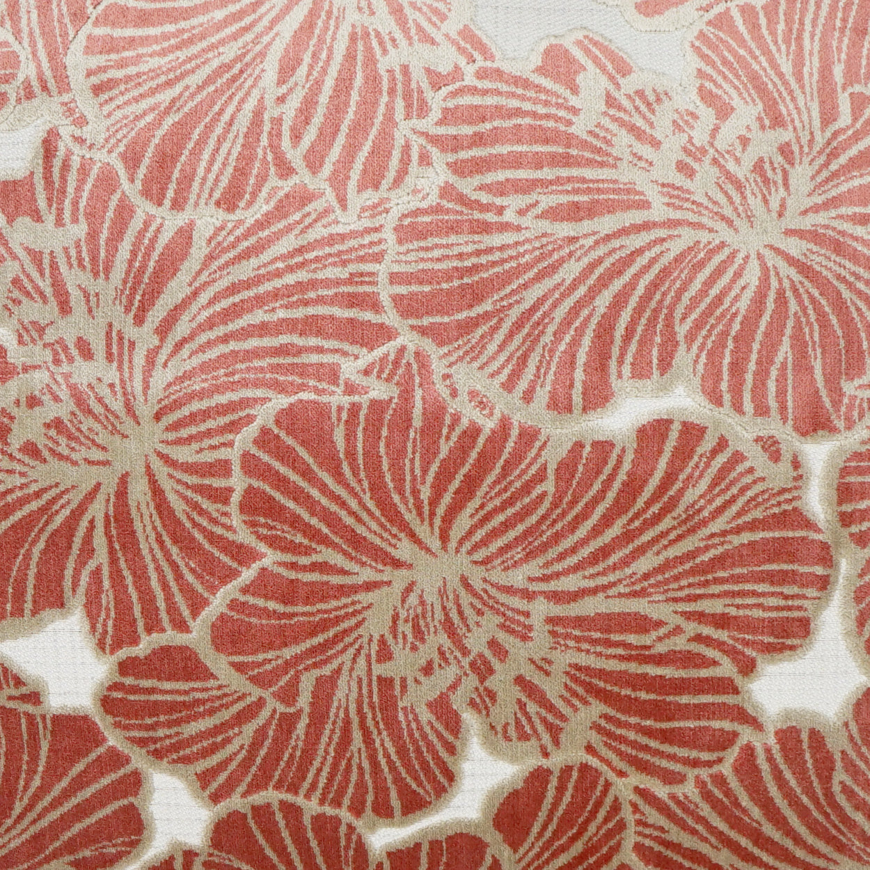 Red floral fabric with cream outlines; hibiscus-style blossoms, bold tropical print for dresses or upholstery.