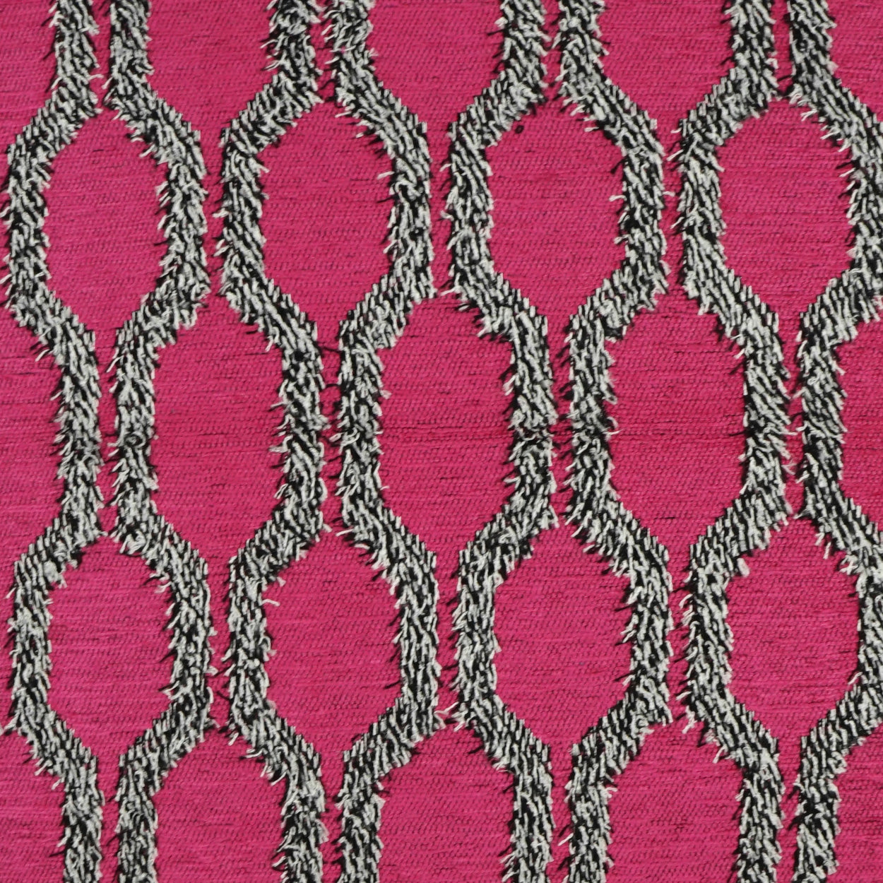 Magenta fabric with black-and-white rope lattice pattern forming elongated chain-link shapes.