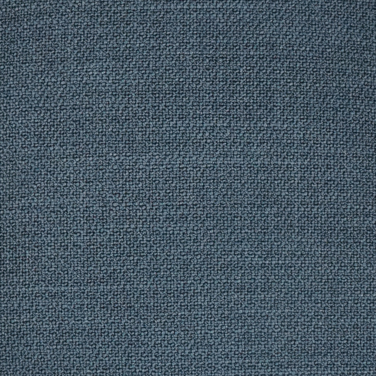 Blue-gray woven fabric texture with tight, speckled weave.