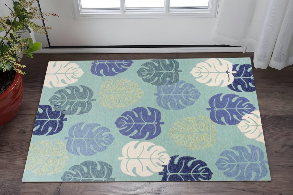 7' X 9' Turquoise And Ivory Botanical Leaves Hand Tufted Area Rug