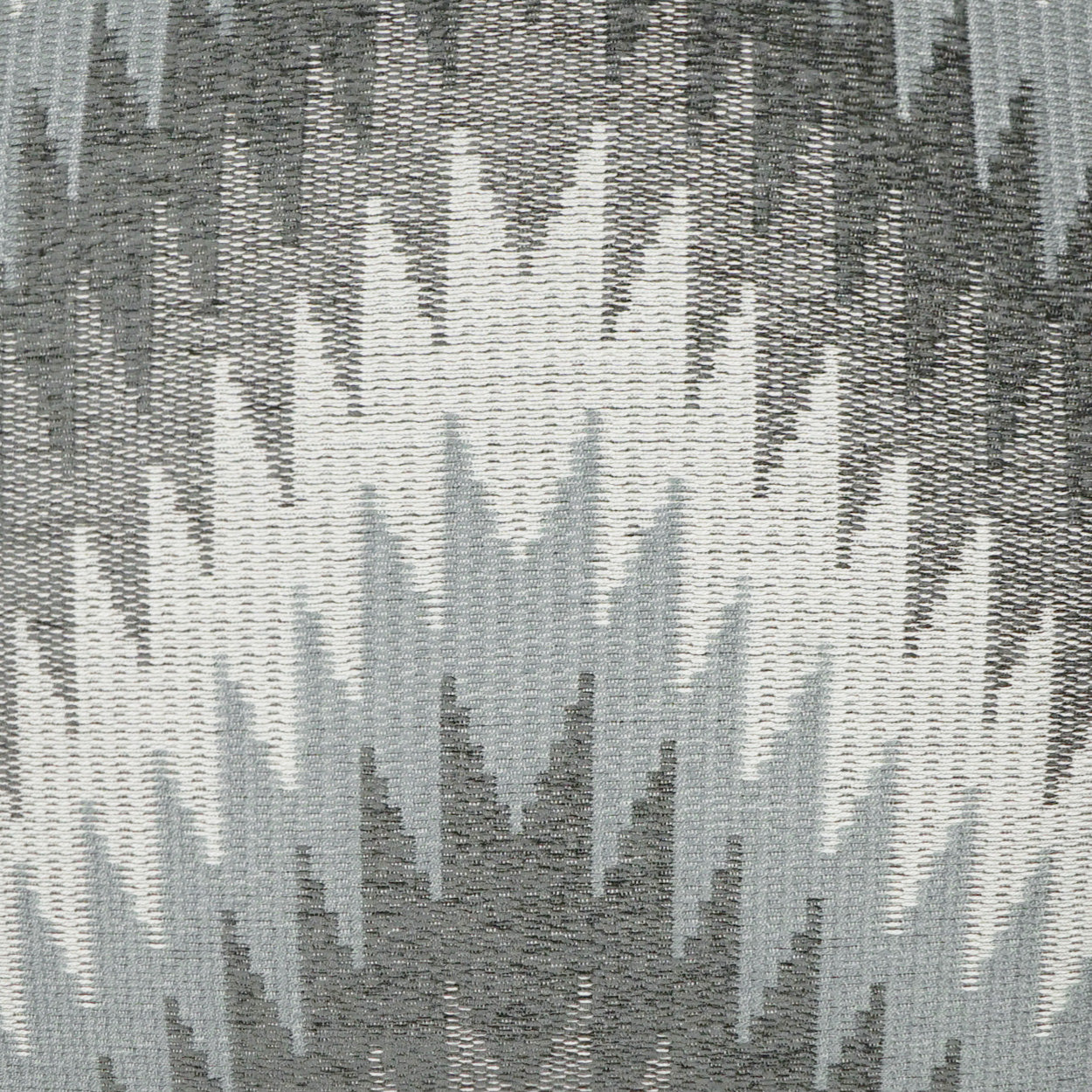 Gray ikat-style woven fabric with chevron zigzag pattern in varying gray tones.