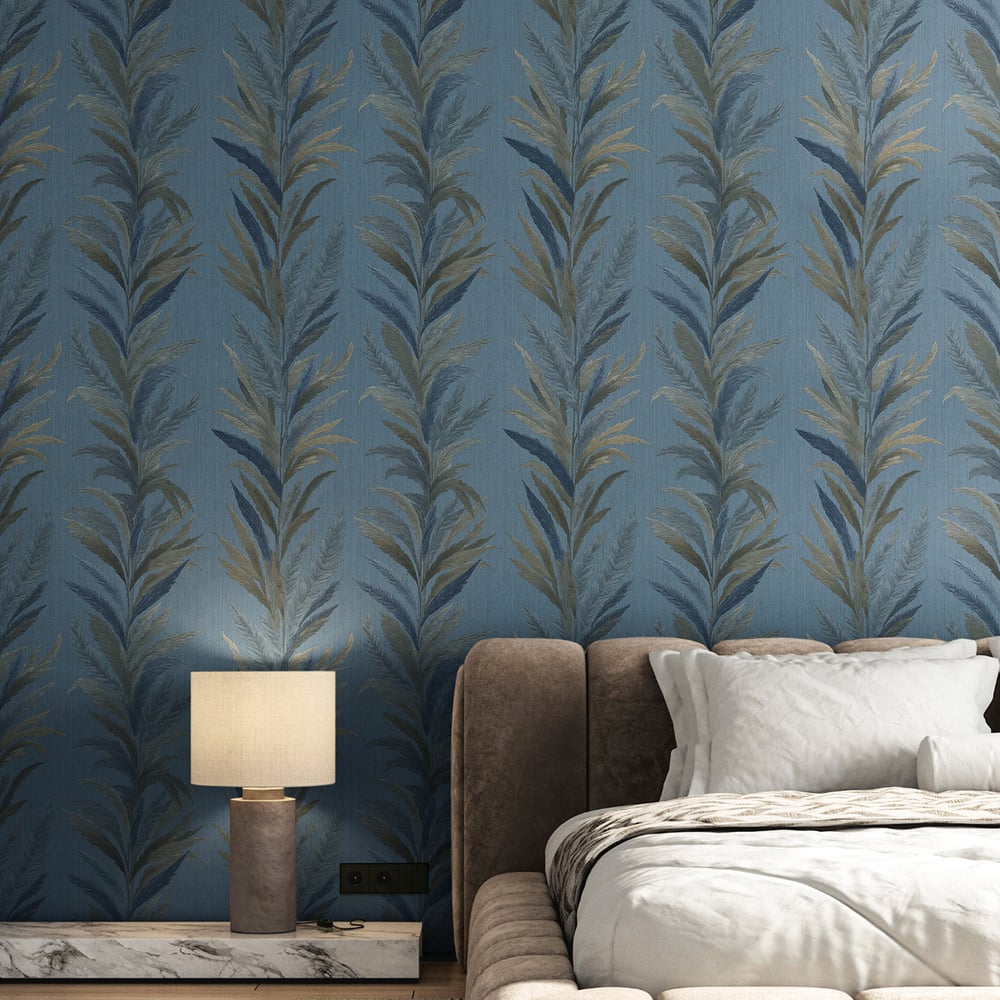 Blue leaf flourish wallpaper with gold embossed pattern.