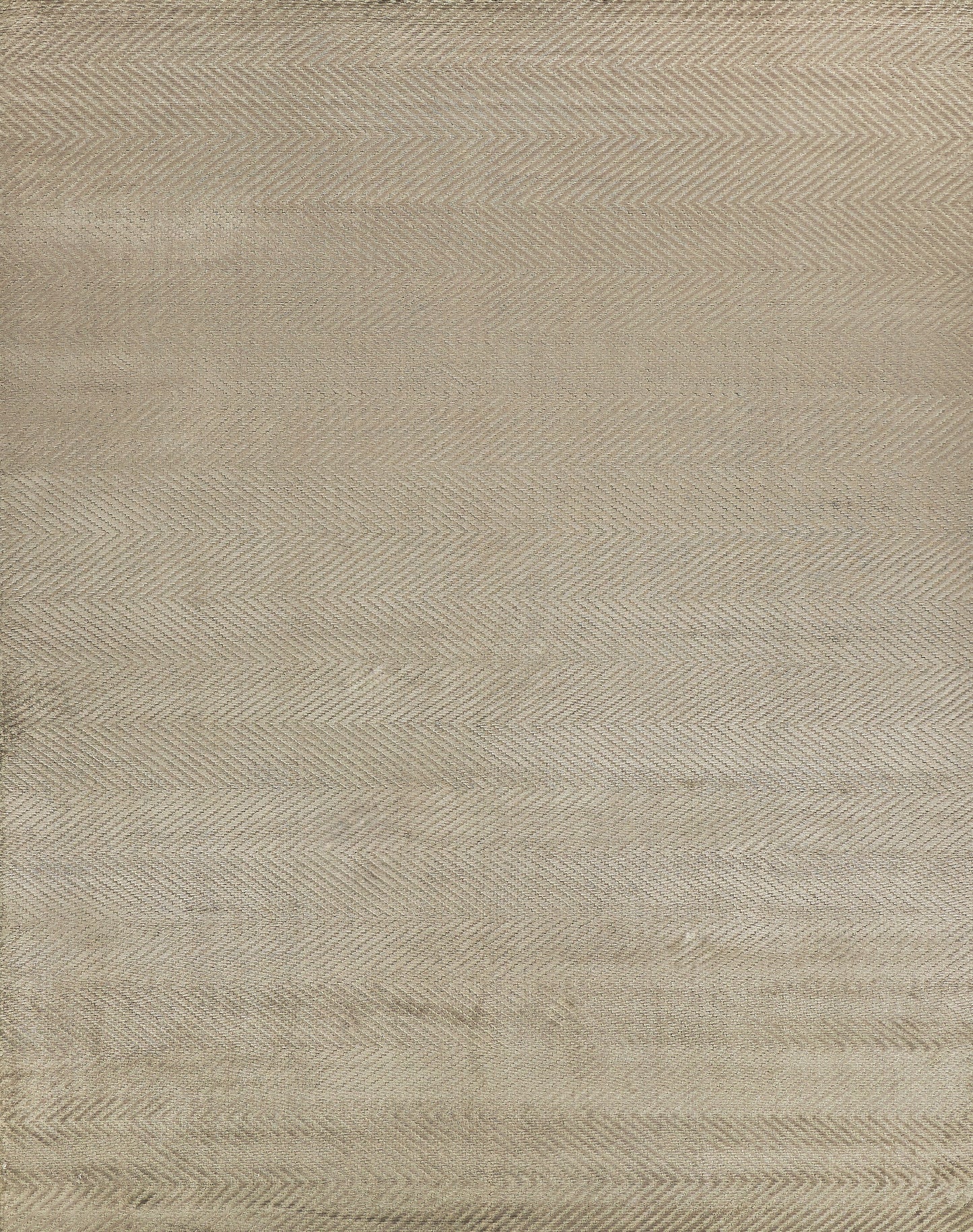 Beige textured rug with subtle chevron/herringbone pattern; linen-like weave, versatile neutral.