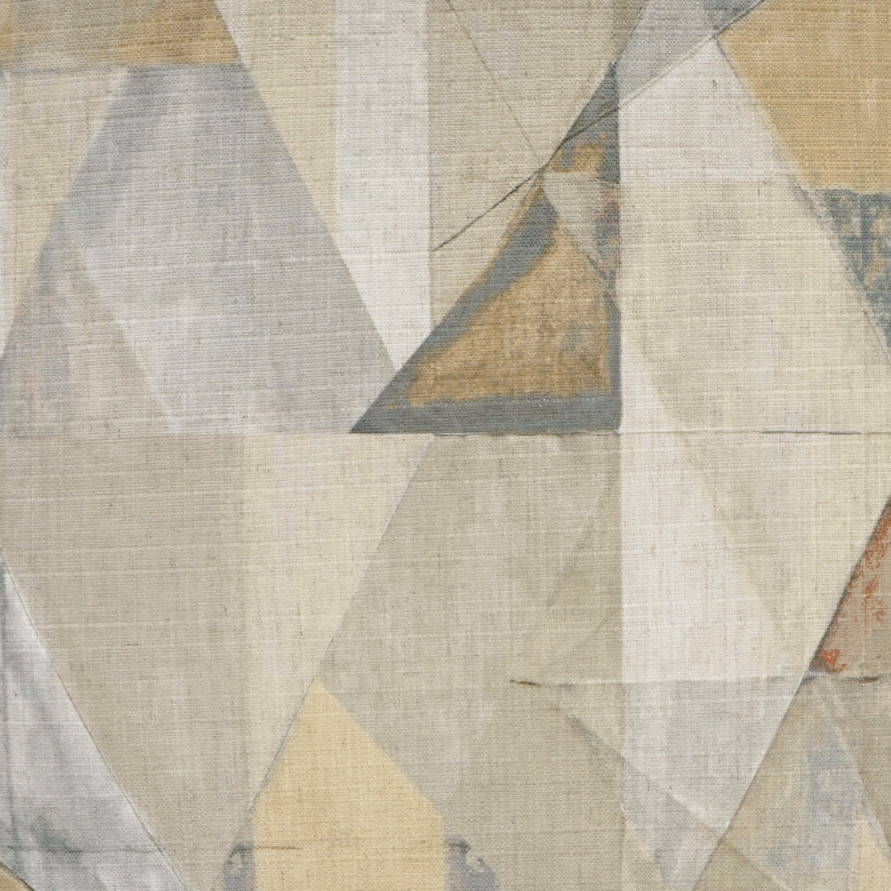 Abstract geometric fabric texture with overlapping beige, ivory, gray & tan triangles; muted canvas look.