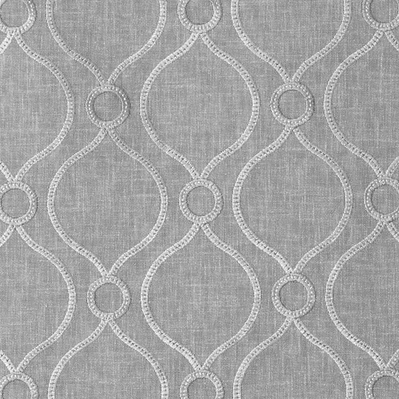 Gray linen-textured drapery fabric with white embroidered looping trellis pattern.