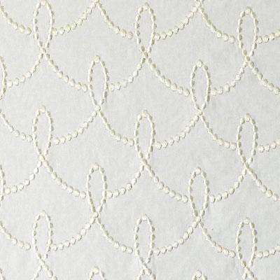 Cream upholstery fabric with white embroidered chain-loop pattern; decorative texture suitable for furniture upholstery.
