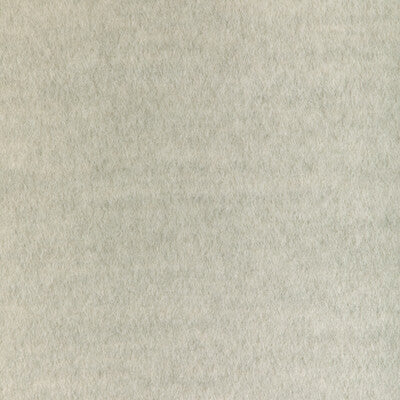 Soft, light gray and silver faux fur texture fabric with a plush, fuzzy surface, ideal for crafting or home decor.
