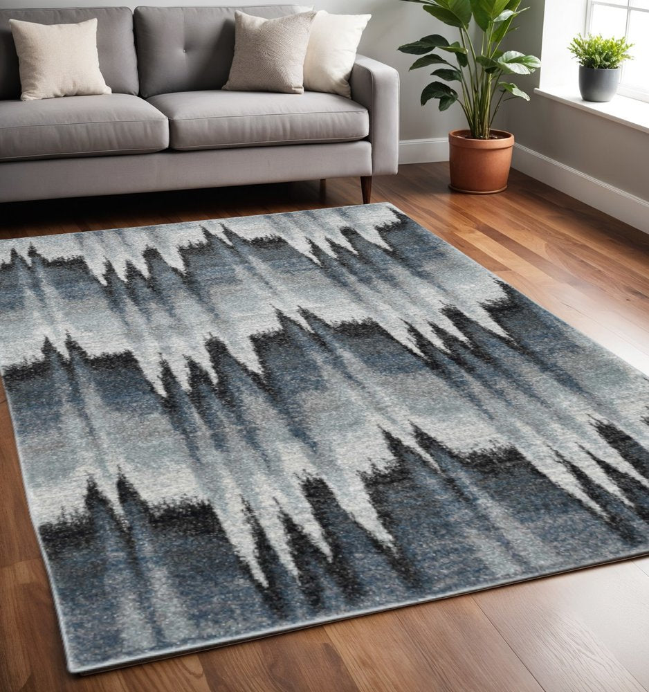 5' X 8' Ivory Blue And Gray Abstract Area Rug
