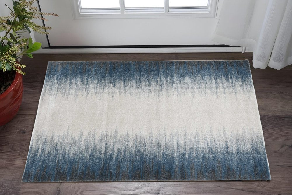 3' X 5' Ivory And Blue Abstract Area Rug