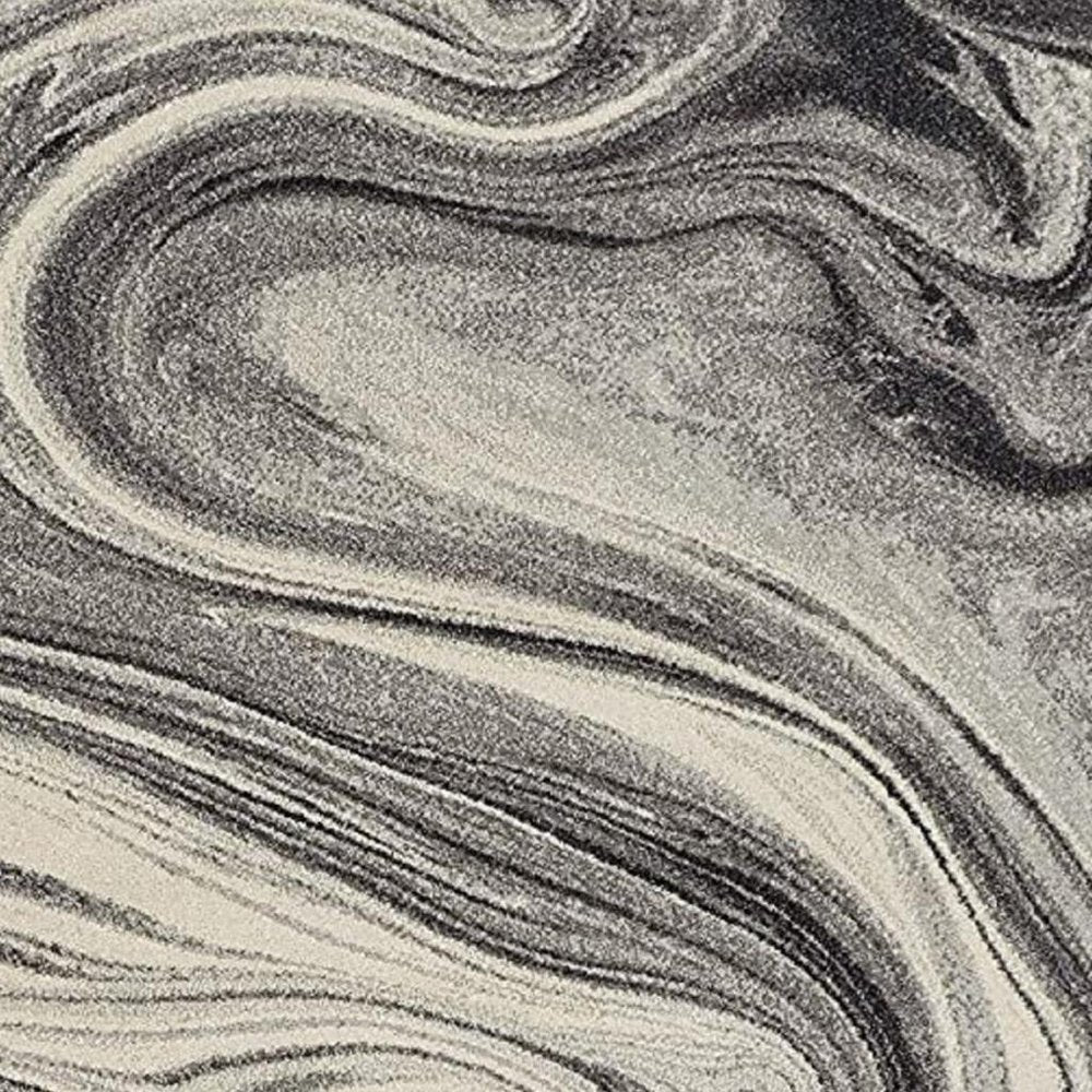 5' X 8' Ivory Black And Gray Abstract Area Rug