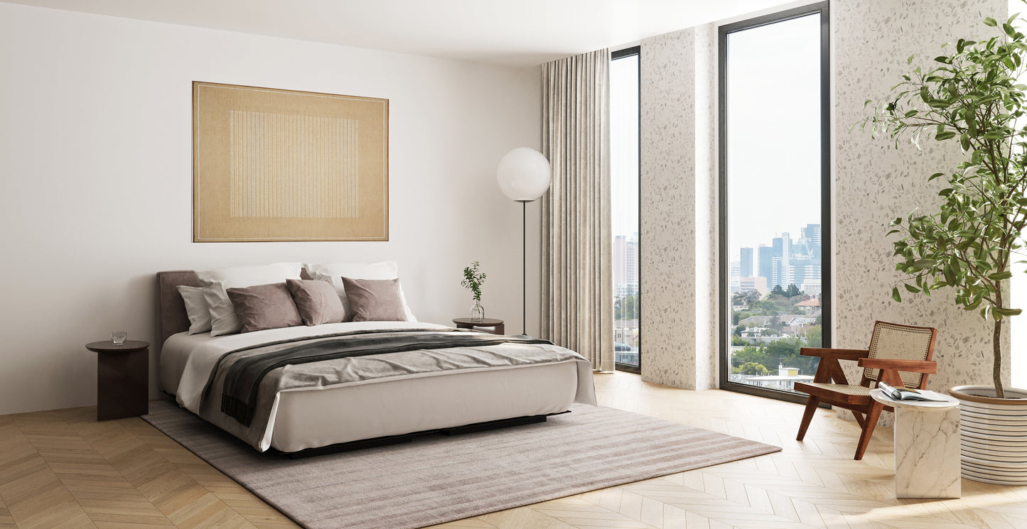 Indoor hand-loomed striped rug in neutral beige tones, 2' x 3', shown in a bedroom setting.