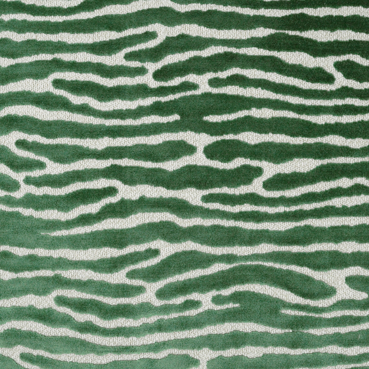 Green fabric with white zebra-like wavy stripes; soft textile pattern suitable for upholstery or apparel.