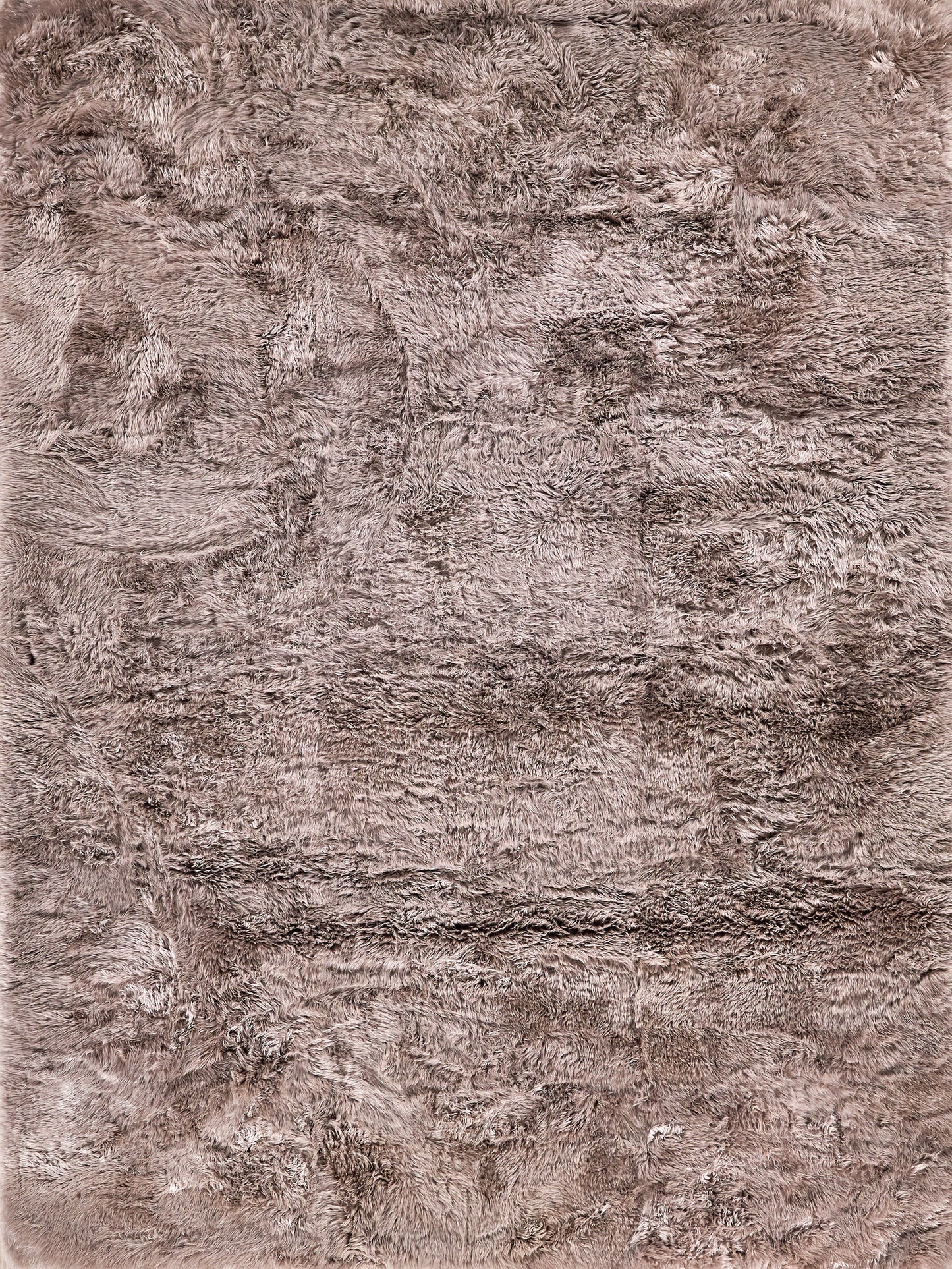 Taupe sheepskin indoor hand-stitched rug, 2' x 3', rectangular and soft.