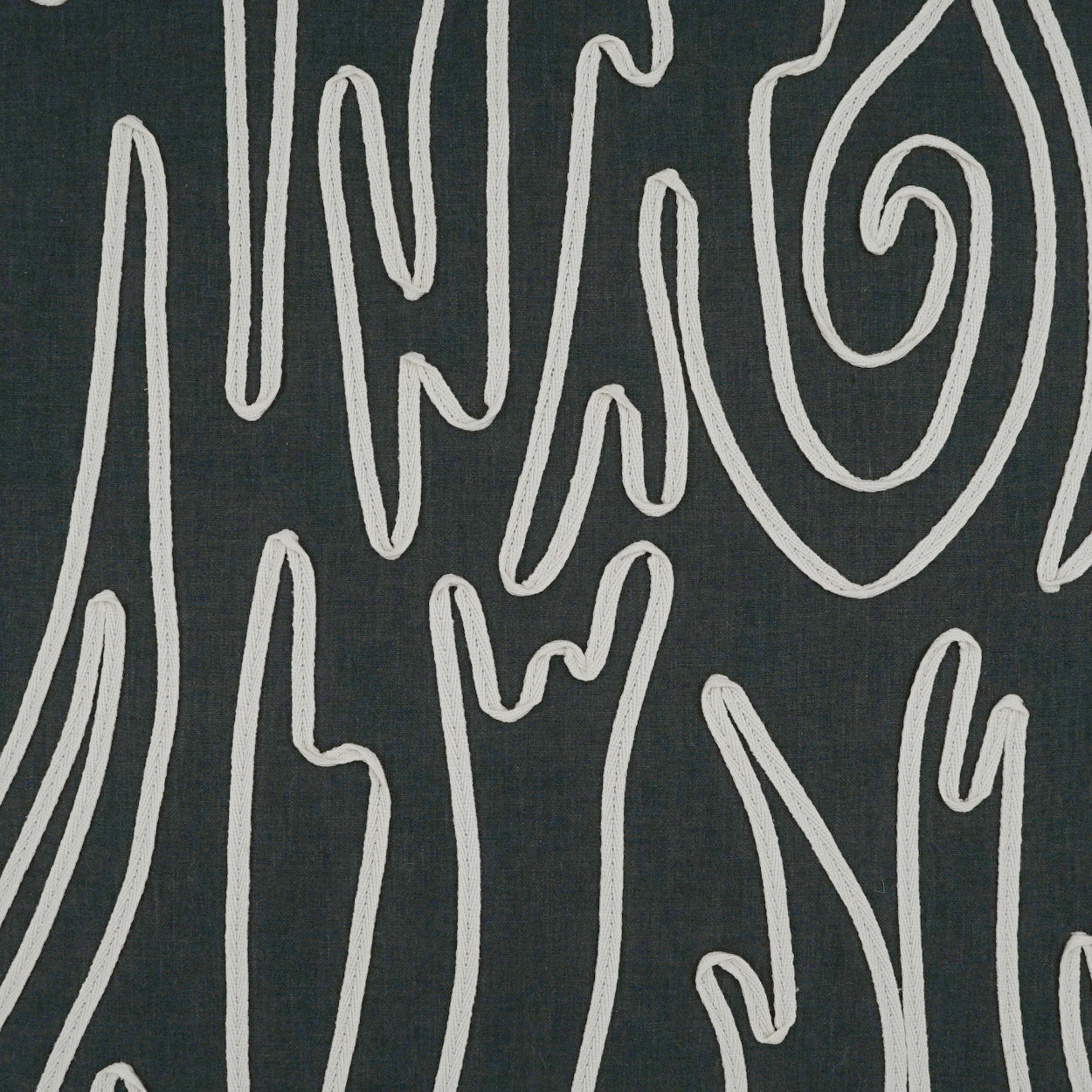 Dark charcoal fabric with white abstract scribble lines.