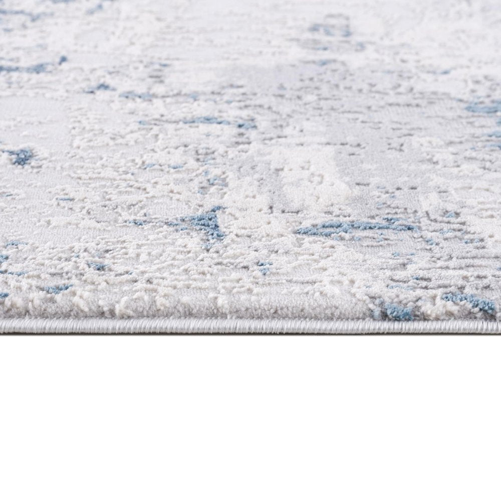 5' X 8' Blue And Ivory Abstract Strokes Area Rug