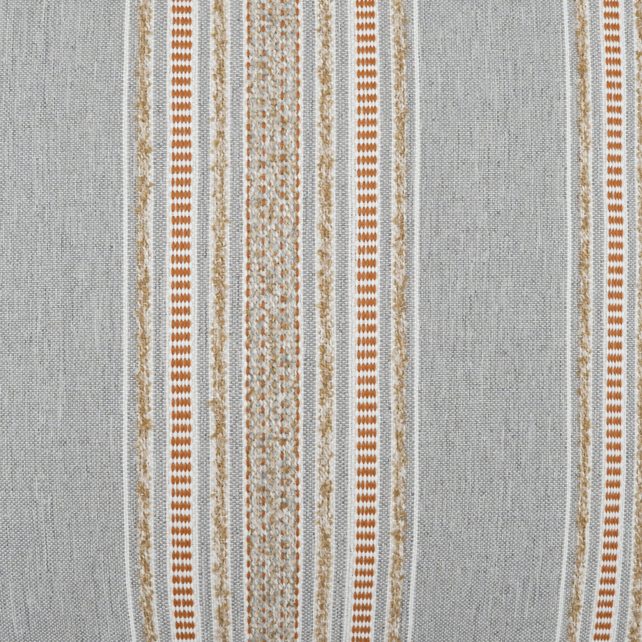 Grey woven fabric with vertical cream and orange-brown stripes, featuring varied textures and thin decorative lines.