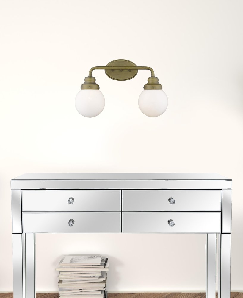 Two Light Gold Wall Sconce with Round Glass Shade