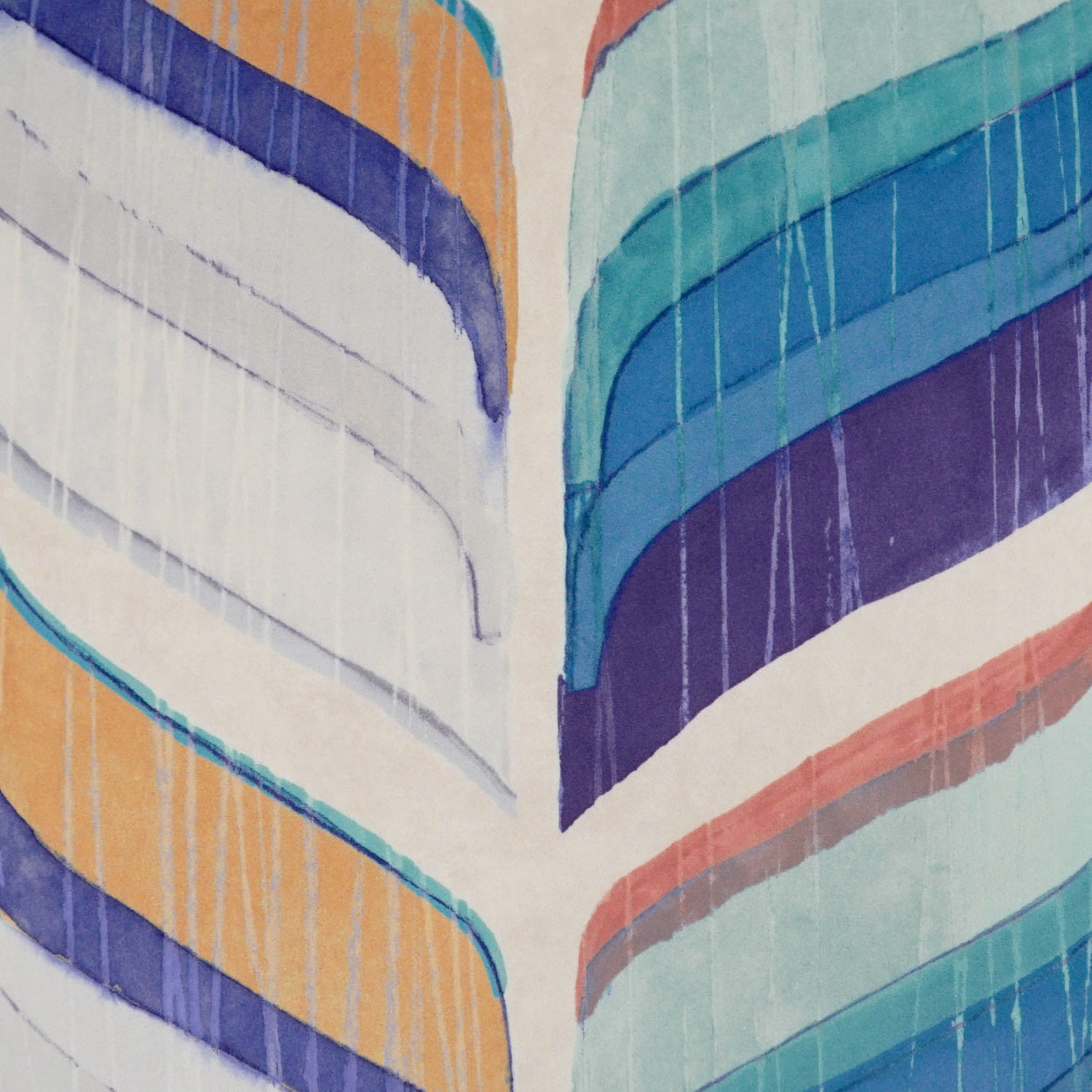 Colorful fabric pattern with wavy orange, teal, blue and purple bands forming a heart-like shape.