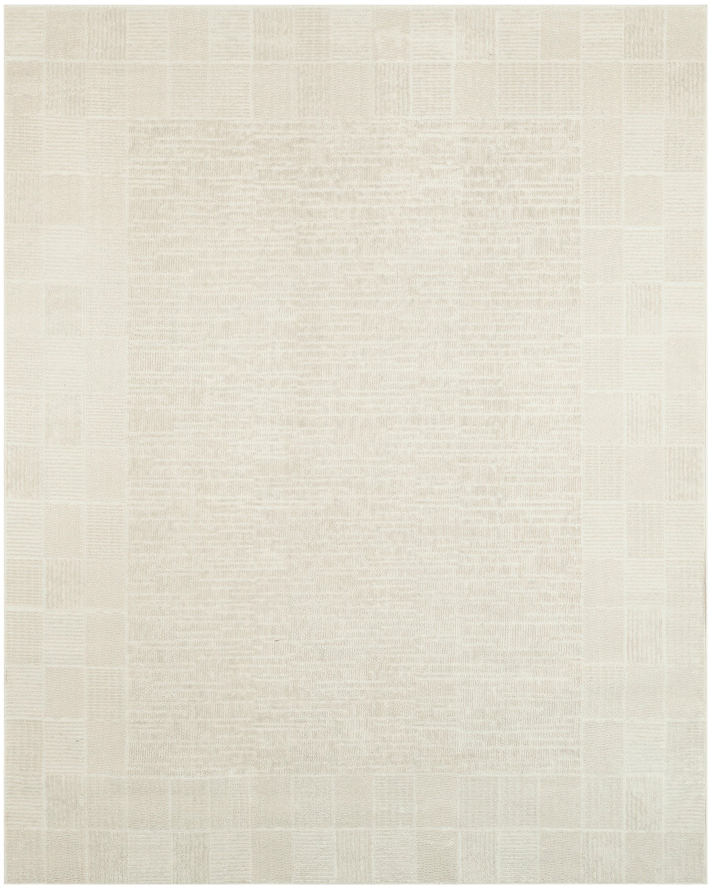 Cream patchwork rug with beige square blocks and woven texture; neutral, rectangular area rug.