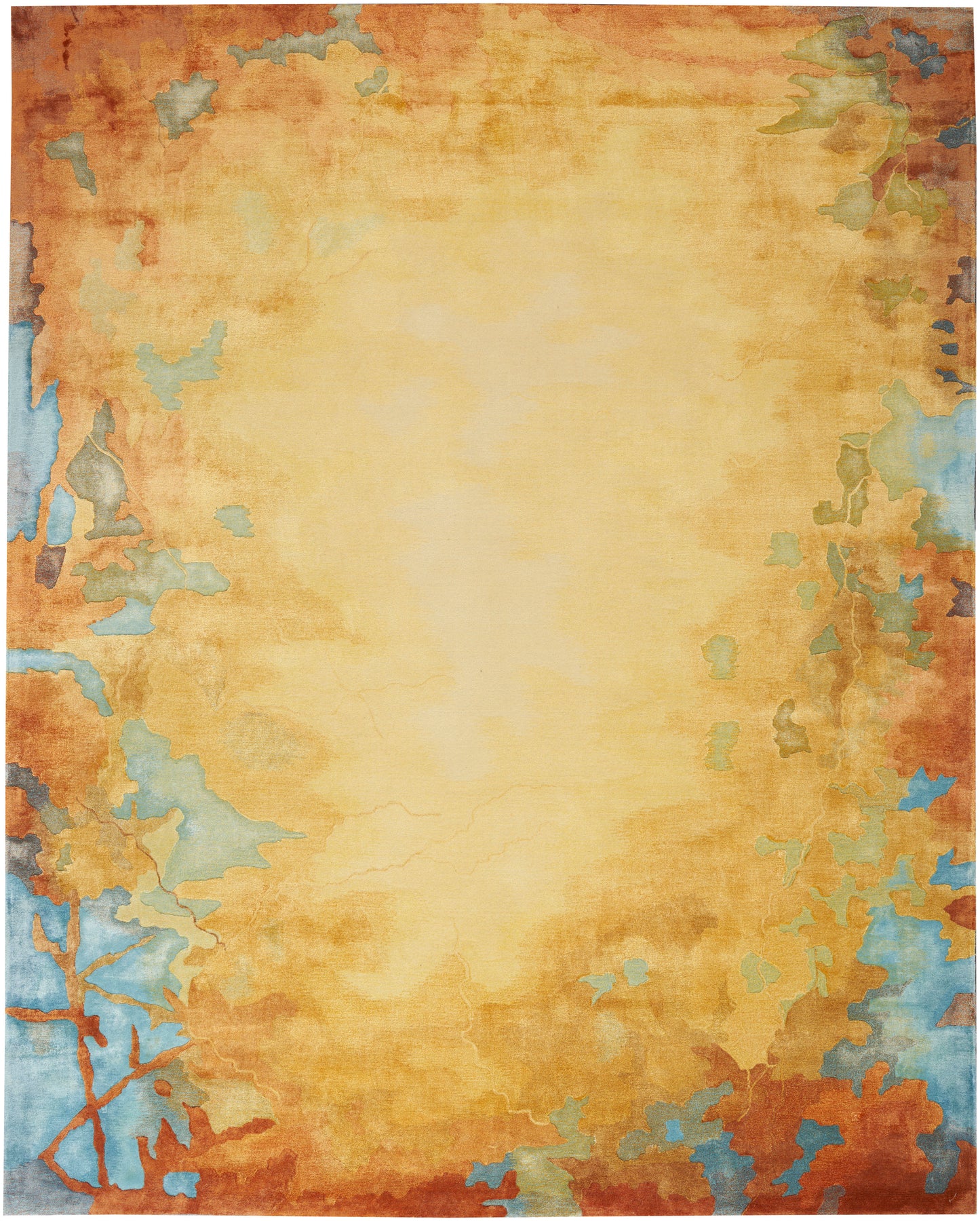 Rectangular area rug with a warm yellow center, orange border, and distressed teal, blue and green patches around the edges.