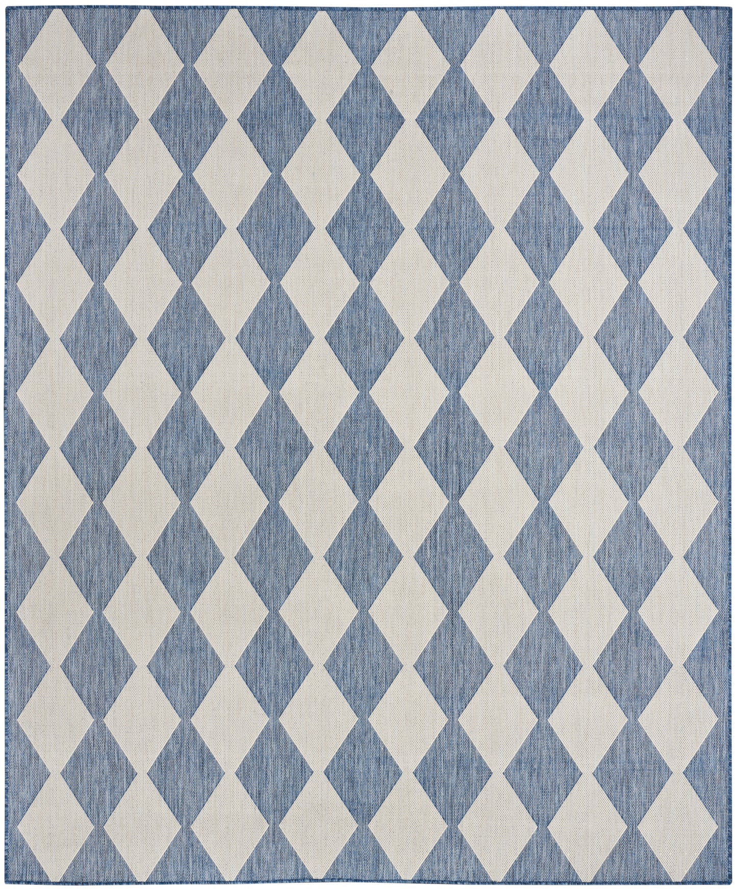 Blue denim-style rug with cream diamond harlequin pattern, woven texture and narrow border.