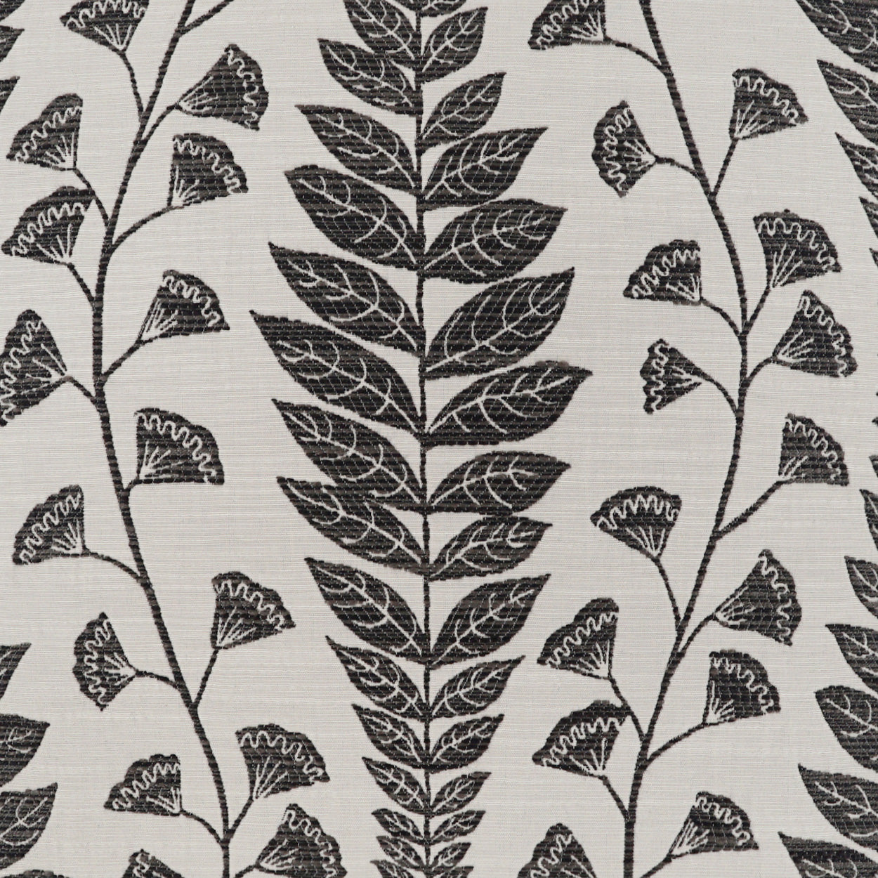 Beige pillow with black floral print; repeating stems and leaves, 24" x 24