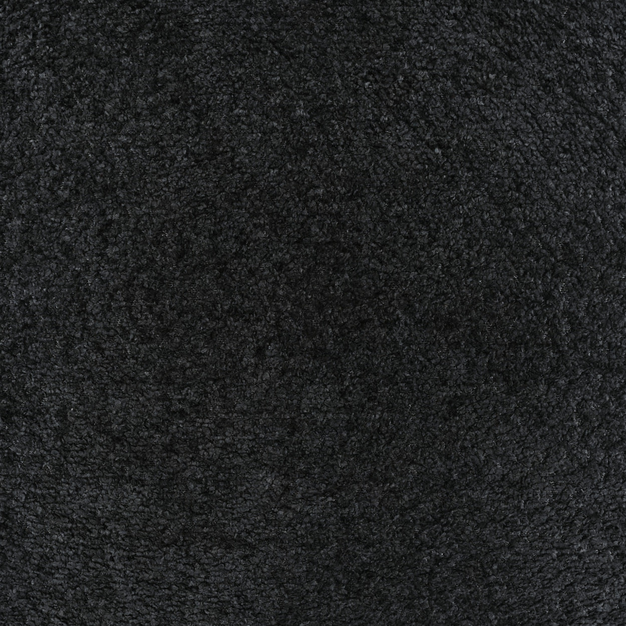 Close-up of black textured fabric with a soft, nubby surface; charcoal color, suitable for upholstery or crafts.