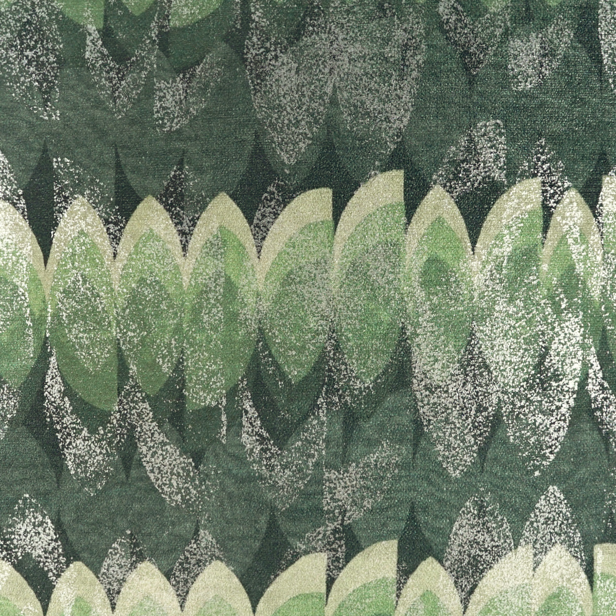 Olive and lime green fabric with overlapping leaf-shaped motifs in a geometric, textured pattern on a 24" x 24" pillow.