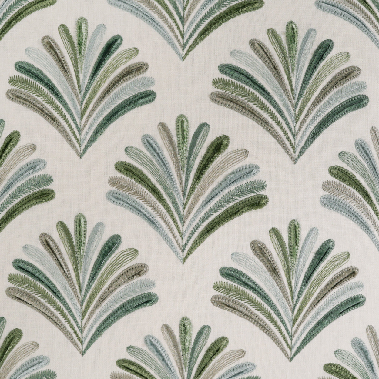 Beige fabric with repeating teal-green palm-fan motifs in layered, feathered leaves pattern.